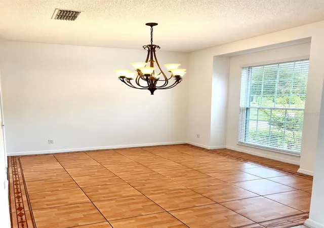 Photo 3 of Single family home for sale at 3805 Running Water Dr, Orlando, FL 32829 | MLS# O6450836 | Listing updated on 2026-10-22