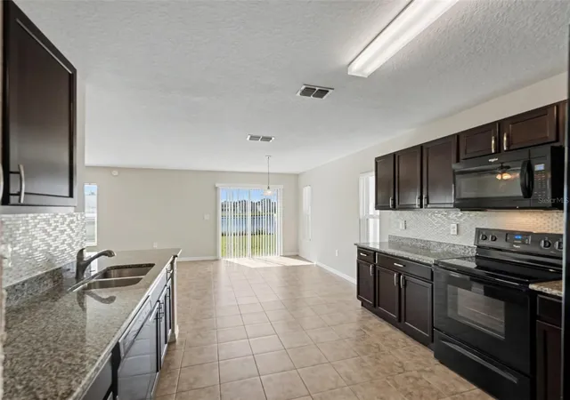 Photo 4 of Single family home for sale at 10420 Laguna Plains Dr, Riverview, FL 33578 | MLS# O6450847 | Listing updated on 2026-10-22
