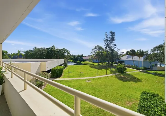 Listing Photo 1 - Condo for sale in building located at 5940 Pelican Bay Plz S, Gulfport, FL 33707 - Unit #203