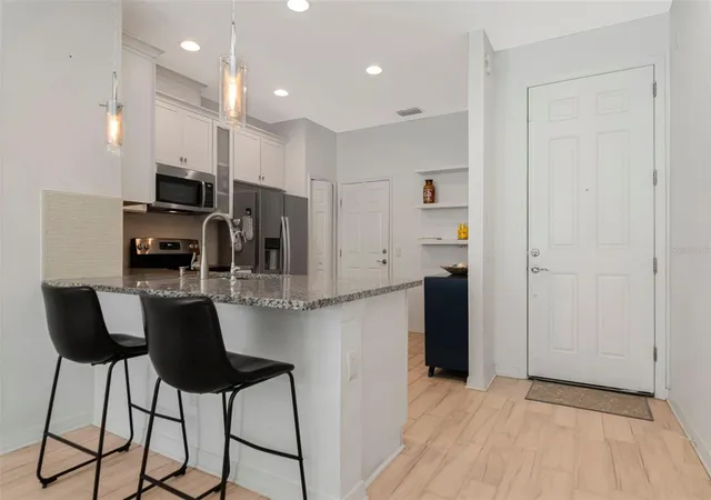 Photo 3 of Townhouse for sale at 2455 Golden Pasture Cir, Clearwater, FL 33764 | MLS# TB8559336 | Listing updated on 2026-10-20