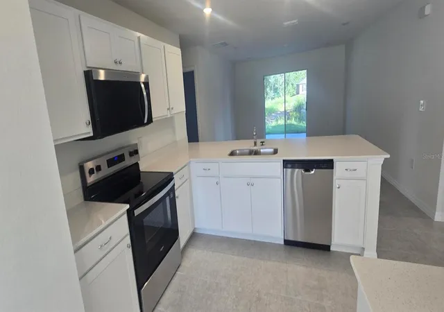 Photo 4 of Single family home for sale at 207 Spoonbill Ln, Kissimmee, FL 34759 | MLS# C7532188 | Listing updated on 2026-10-22