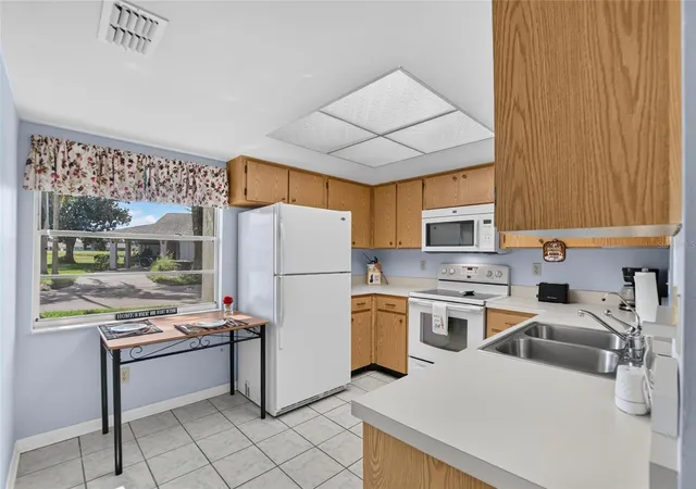 Photo 2 of Condo for sale at 2017 Hullhouse Dr #351, Sun City Center, FL 33573 | MLS# TB8559381 | Listing updated on 2026-10-23