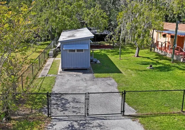 Photo 4 of Manufactured home for sale at 14621 & 14617 Coral Dr, Hudson, FL 34667 | MLS# W7890431 | Listing updated on 2026-10-23