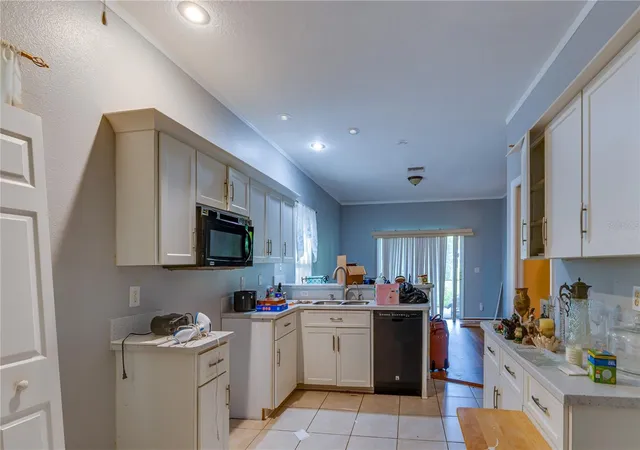 Photo 4 of Single family home for sale at 910 Eldridge St, Clearwater, FL 33755 | MLS# TB8559496 | Listing updated on 2026-10-22