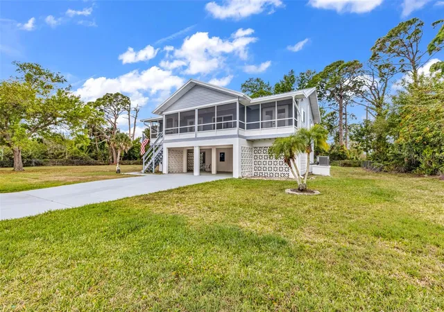Photo 1 of Single family home for sale at 3059 Holcomb Rd, Port Charlotte, FL 33981 | MLS# C7532216 | Listing updated on 2026-10-22