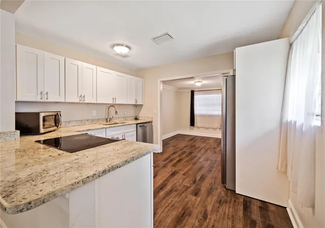 Photo 3 of Single family home for sale at 14902 Pinecrest Rd, Tampa, FL 33613 | MLS# TB8559499 | Listing updated on 2026-10-23