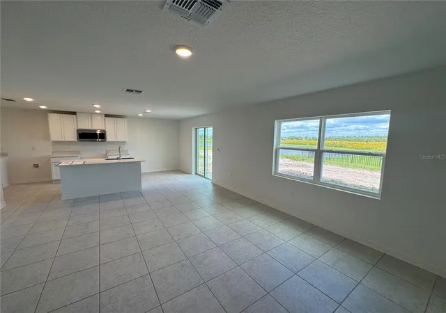 Photo 3 of Single family home for sale at 3877 Bluethread Way, Kissimmee, FL 34759 | MLS# O6451033 | Listing updated on 2026-10-22