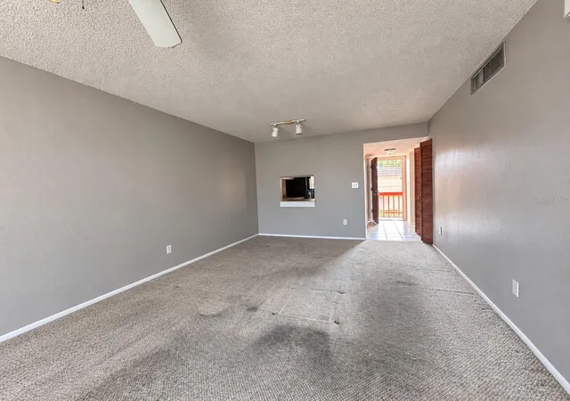 Listing Photo 1 - Condo for sale in building located at 2854 N Powers Dr, Orlando, FL 32818 - Unit #102
