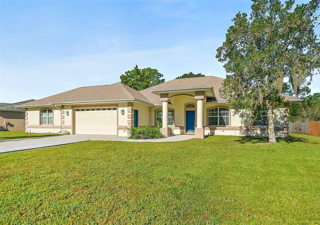 Photo 3 of Sale Pending at 46 Whispering Pine Dr, Palm Coast, FL 32164 | MLS# FC322236 | Listing updated on 2026-10-26
