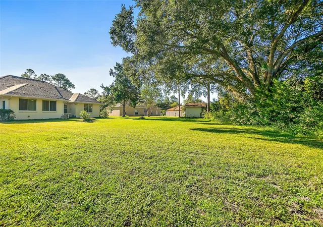 Photo 3 of Sale Pending at 46 Whispering Pine Dr, Palm Coast, FL 32164 | MLS# FC322236 | Listing updated on 2026-10-26