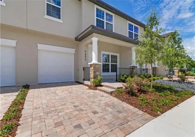 Photo 1 of Townhouse for sale at 4404 Summer Flowers Pl, Kissimmee, FL 34746 | MLS# O6451135 | Listing updated on 2026-10-26