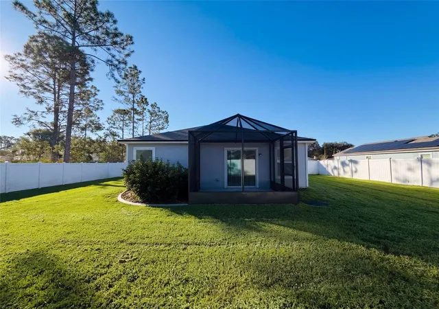Photo 4 of Single family home for sale at 9 Radium Ln, Palm Coast, FL 32164 | MLS# O6451171 | Listing updated on 2026-10-21