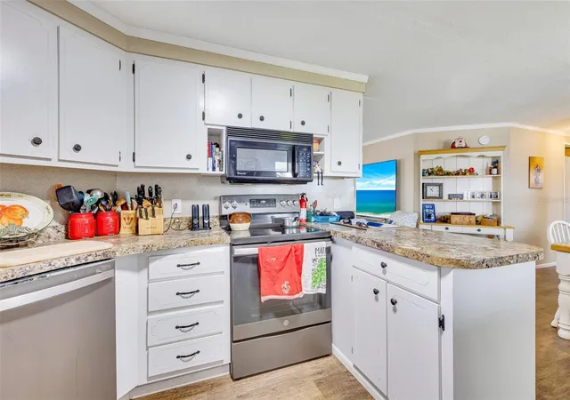Photo 2 of Manufactured home for sale at 412 Vivar, North Port, FL 34287 | MLS# TB8559690 | Listing updated on 2026-10-28
