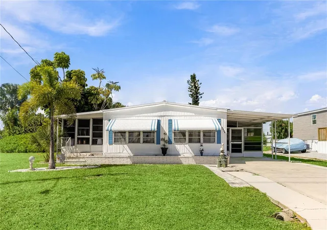 Photo 4 of Manufactured home for sale at 1444 Seagull Dr, Englewood, FL 34224 | MLS# A4710205 | Listing updated on 2026-10-22