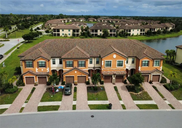 Photo 1 of Townhouse for sale at 20448 Lagente Cir, Venice, FL 34293 | MLS# A4710206 | Listing updated on 2026-10-22