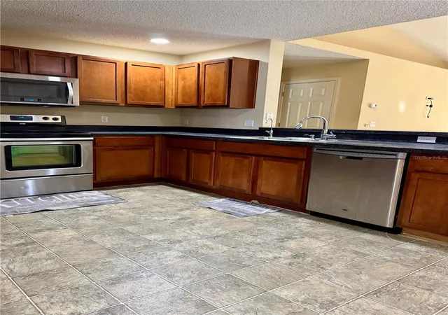 Photo 2 of Single family home for sale at 1410 Lodge Ter, Deltona, FL 32738 | MLS# V4951904 | Listing updated on 2026-10-22