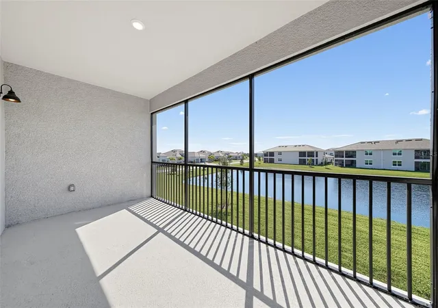 Listing Photo 1 - Condo for sale in building located at 13002 Pink Sand Ct, VENICE, FL 34293 - Unit #203