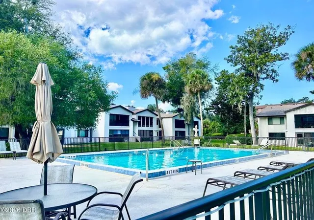 Photo 1 of Condo for sale at 1 Tomoka Oaks Blvd #120, Ormond Beach, FL 32174 | MLS# V4951907 | Listing updated on 2026-10-21