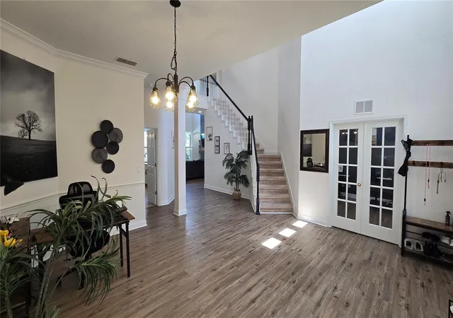 Photo 3 of Single family home for sale at 2141 Wild Tamarind Blvd, Orlando, FL 32828 | MLS# O6451230 | Listing updated on 2026-10-23