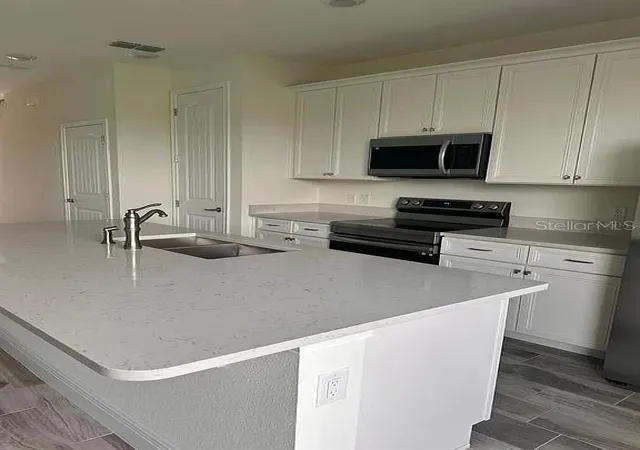 Photo 1 of Townhouse for sale at 3077 Caribbean Soul Dr, Kissimmee, FL 34747 | MLS# TB8559805 | Listing updated on 2026-10-21