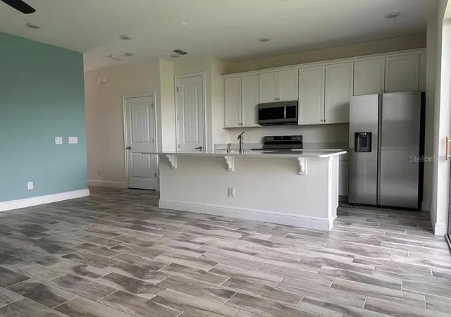 Photo 2 of Townhouse for sale at 3077 Caribbean Soul Dr, Kissimmee, FL 34747 | MLS# TB8559805 | Listing updated on 2026-10-21