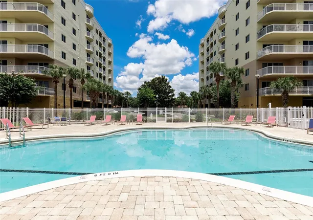 Photo 1 of Condo for sale at 6336 Buford St #404, Orlando, FL 32835 | MLS# O6451286 | Listing updated on 2026-10-22