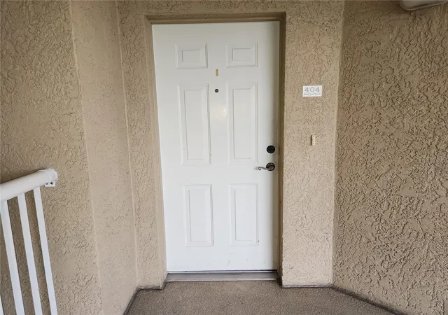 Photo 2 of Condo for sale at 6336 Buford St #404, Orlando, FL 32835 | MLS# O6451286 | Listing updated on 2026-10-22
