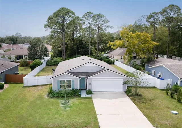 Photo 1 of Single family home for sale at 98 Raemoor Dr, Palm Coast, FL 32164 | MLS# FC322252 | Listing updated on 2026-10-23