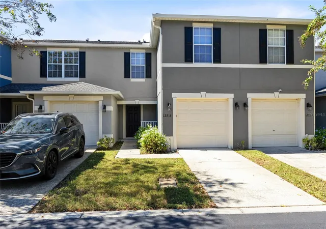 Photo 1 of Townhouse for sale at 12916 Lexington Summit St, Orlando, FL 32828 | MLS# O6451332 | Listing updated on 2026-10-24