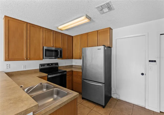Photo 3 of Townhouse for sale at 12916 Lexington Summit St, Orlando, FL 32828 | MLS# O6451332 | Listing updated on 2026-10-24