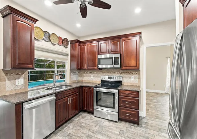 Photo 4 of Single family home for sale at 7700 Cypress Tr Ct, New Port Richey, FL 34653 | MLS# TB8559888 | Listing updated on 2026-10-23