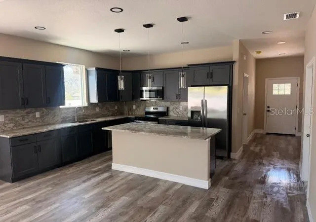 Photo 2 of Single family home for sale at 3204 E Columbus Dr, Tampa, FL 33605 | MLS# TB8559892 | Listing updated on 2026-10-22