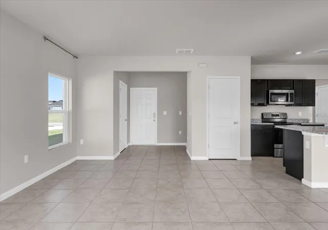 Photo 3 of Single family home for sale at 718 Eagle Landing Blvd, Winter Haven, FL 33880 | MLS# O6451407 | Listing updated on 2026-10-24