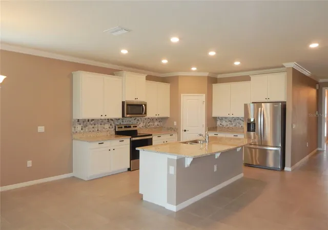 Photo 3 of Single family home for sale at 13413 Golden Lime Ave, Spring Hill, FL 34609 | MLS# TB8559989 | Listing updated on 2026-10-22