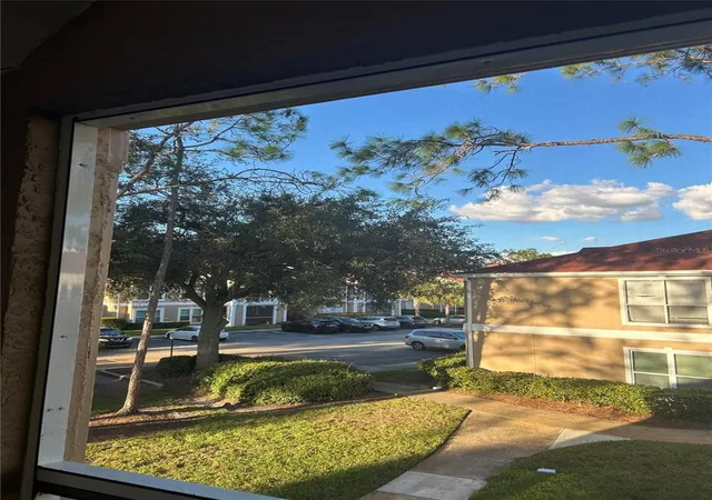 Listing Photo 1 - Condo for sale in building located at 9481 Highland Oak Dr, Tampa, FL 33647 - Unit #906