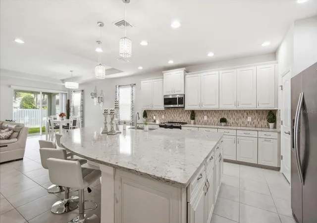 Photo 4 of Single family home for sale at 13821 Fairway Bunker Dr, Tampa, FL 33626 | MLS# TB8560018 | Listing updated on 2026-10-22