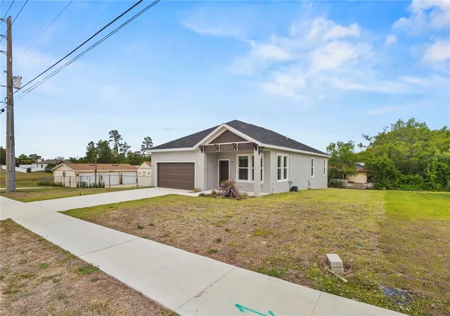 Photo 2 of Single family home for sale at 9211 Northcliffe Blvd, Spring Hill, FL 34606 | MLS# TB8560065 | Listing updated on 2026-10-27