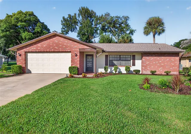 Photo 1 of Single family home for sale at 1056 Kimberly Ct, Port Orange, FL 32129 | MLS# FC322259 | Listing updated on 2026-10-29