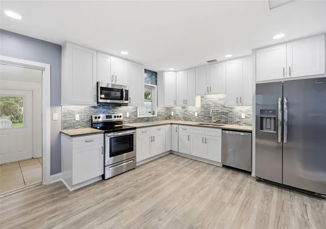 Photo 4 of Single family home for sale at 8407 N Newport Ave, Tampa, FL 33604 | MLS# TB8560082 | Listing updated on 2026-10-30