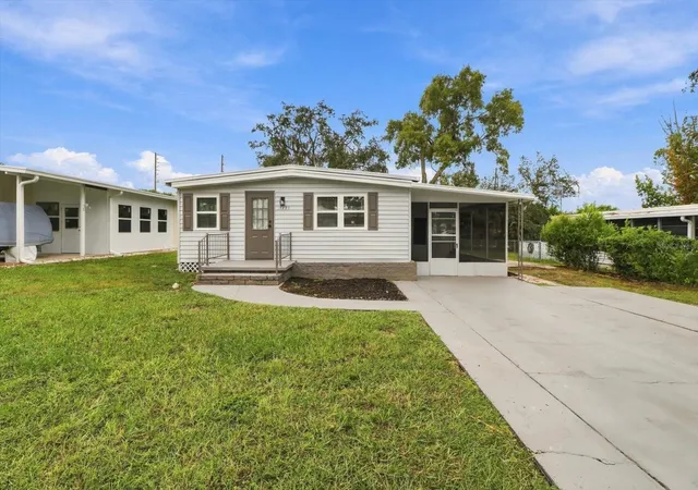 Photo 1 of Manufactured home for sale at 7289 Fairlane Ave, Brooksville, FL 34613 | MLS# OM734413 | Listing updated on 2026-10-21