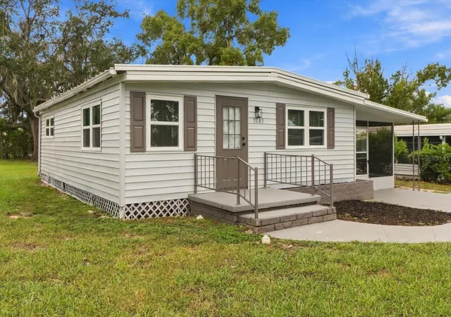 Photo 2 of Manufactured home for sale at 7289 Fairlane Ave, Brooksville, FL 34613 | MLS# OM734413 | Listing updated on 2026-10-21