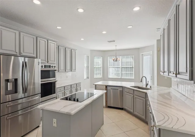 Photo 2 of Single family home for sale at 10142 Canopy Tree Ct, Orlando, FL 32836 | MLS# O6451527 | Listing updated on 2026-10-22