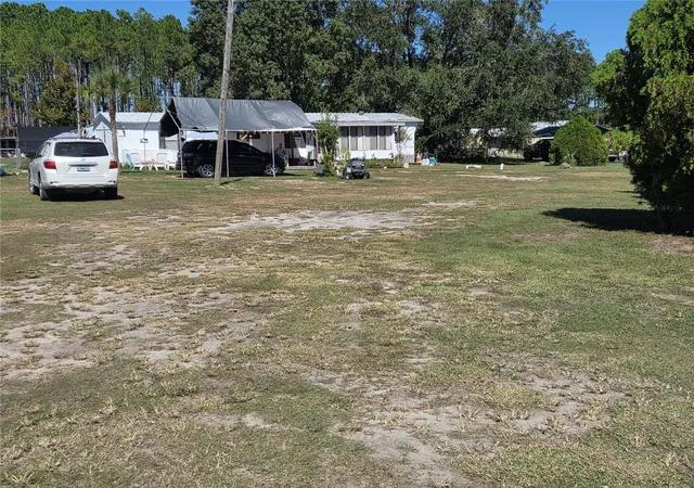 Photo 2 of Manufactured home for sale at 9545 SE 155th Street, Summerfield, FL 34491 | MLS# OM734419 | Listing updated on 2026-10-30