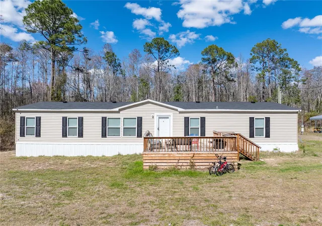 Photo 1 of Manufactured home for sale at 387 Nw Lamar Pl, Lake City, FL 32055 | MLS# GC544339 | Listing updated on 2026-10-22