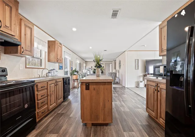 Photo 4 of Manufactured home for sale at 387 NW Lamar Pl, Lake City, FL 32055 | MLS# GC544339 | Listing updated on 2026-10-22