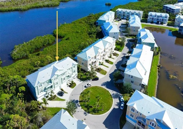 Photo 1 of Townhouse for sale at 10320 Lands End Cir #47, Placida, FL 33946 | MLS# D6149284 | Listing updated on 2026-10-24