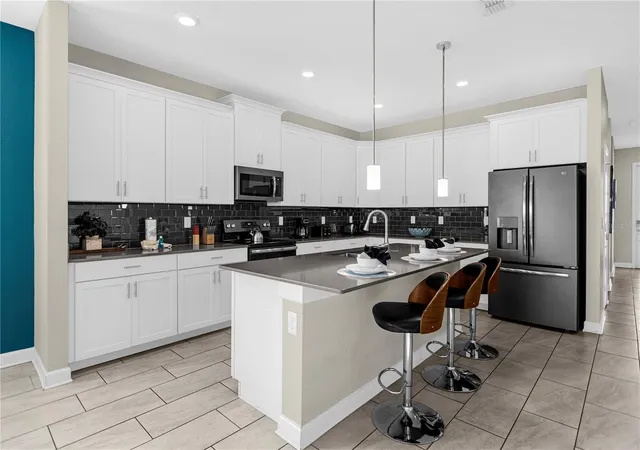 Photo 1 of Single family home for sale at 8950 Cabot Cliffs Dr, Davenport, FL 33896 | MLS# O6451549 | Listing updated on 2026-10-22