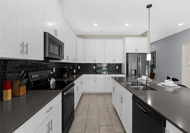 Photo 4 of Single family home for sale at 8950 Cabot Cliffs Dr, Davenport, FL 33896 | MLS# O6451549 | Listing updated on 2026-10-22