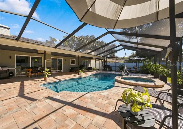 Photo 3 of Sale Pending at 13810 Lake Village Pl, Tampa, FL 33618 | MLS# TB8560160 | Listing updated on 2026-10-26