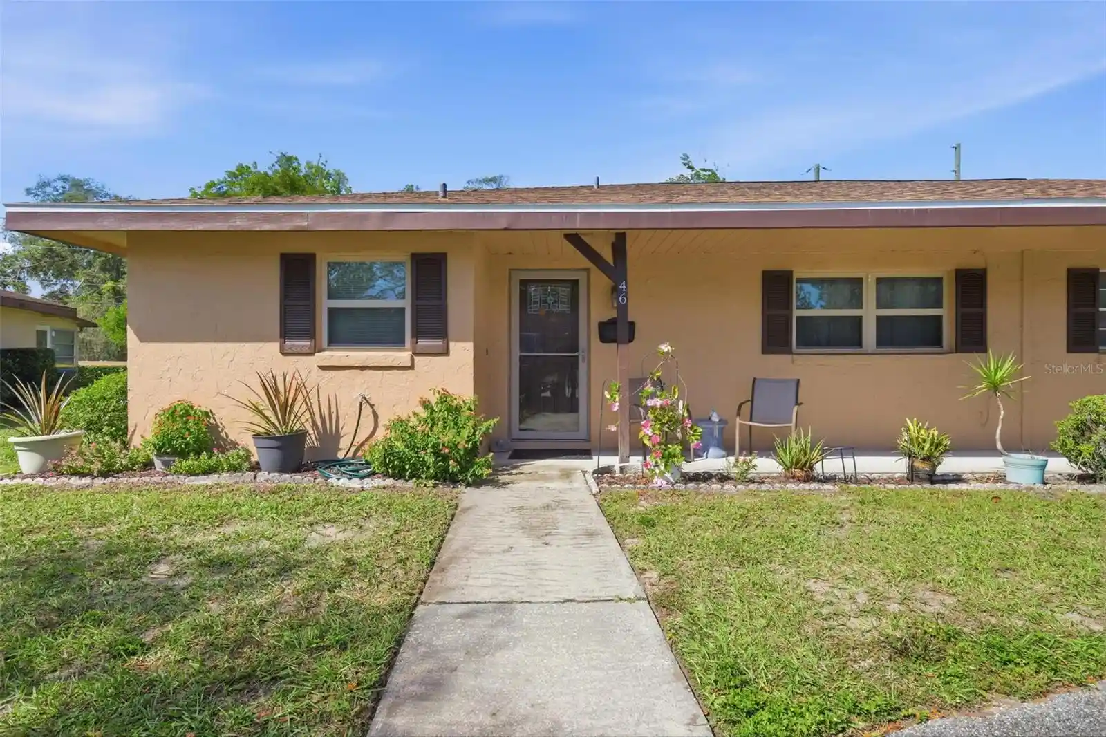 Listing Photo 1 - Condo for sale in 46 Villa Villar Ct located at 46 Villa Villar Ct, DELAND, FL 32724 - Unit #460